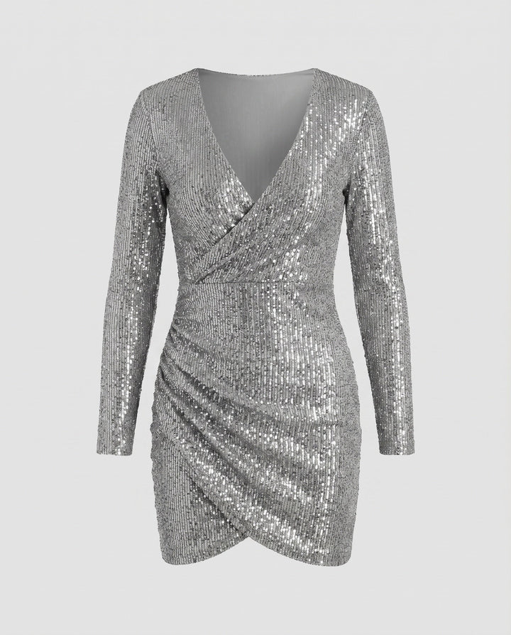 Women's shimmering ruffle wrap mini dress for homecoming. Elegant long sleeve party outfit.