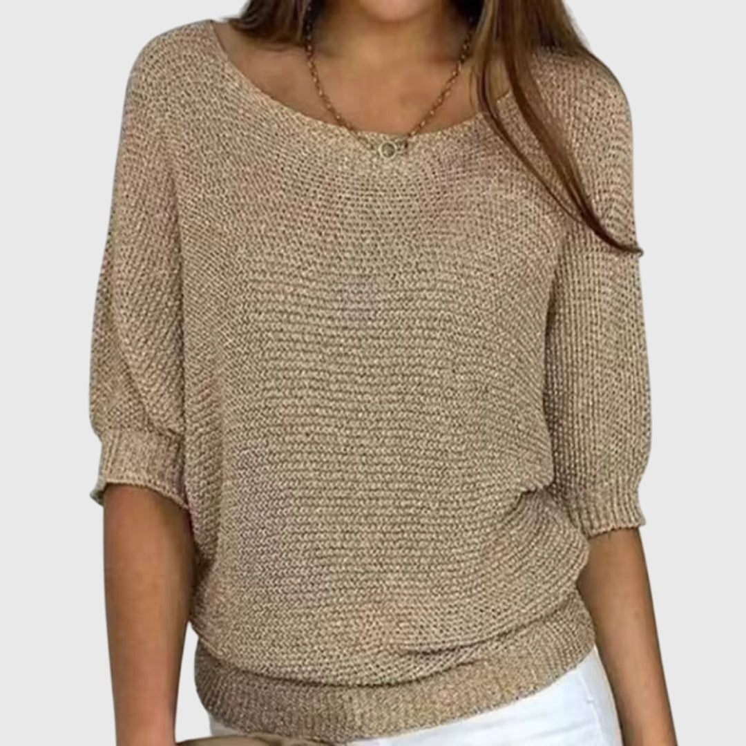 Women's elegant relaxed fit knit sweater in a timeless style, perfect for comfortable all-day wear.