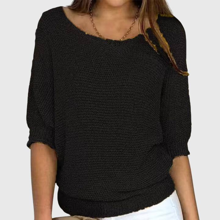 Elegant knit sweater for women, featuring a relaxed fit for effortless style from day to night.