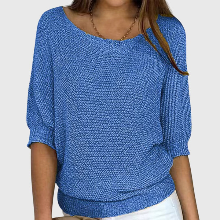 Comfortable women's relaxed fit sweater, a versatile top for timeless fashion and all-season wear.