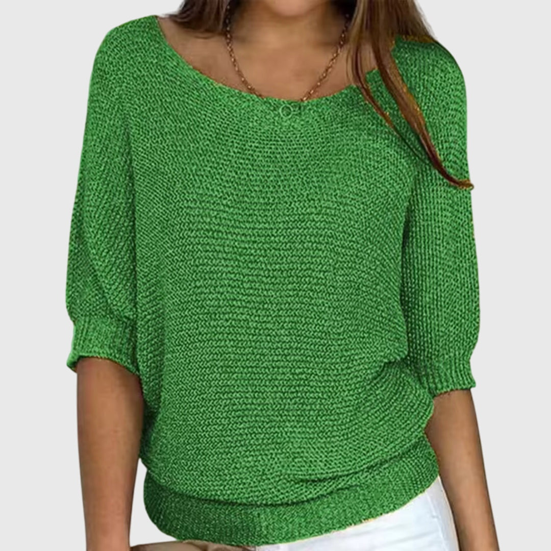 Women's stylish knit sweater, designed with a relaxed fit for ultimate comfort and elegant fashion.