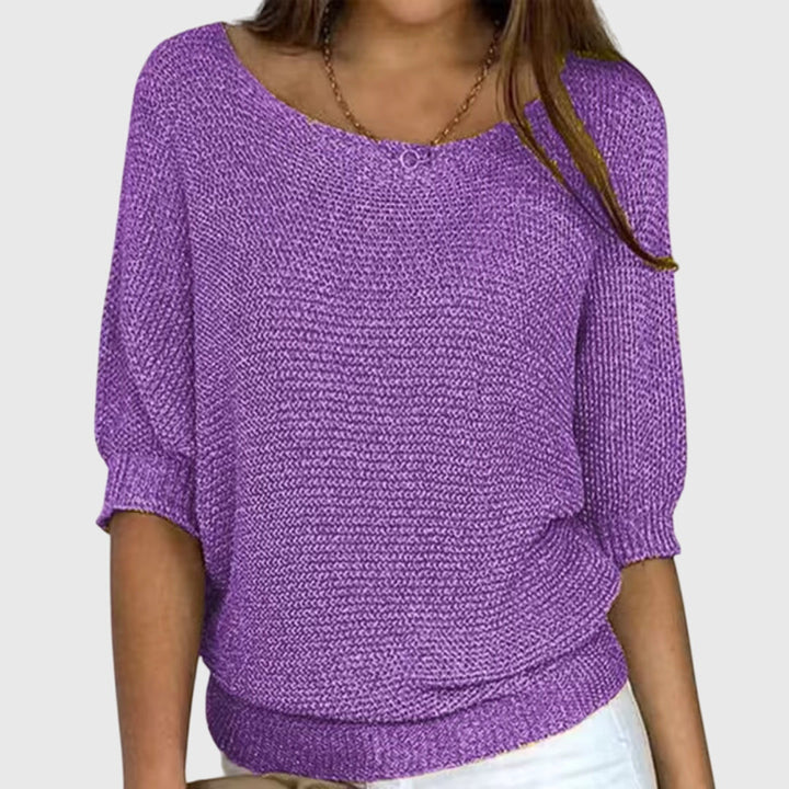 Effortless style women's elegant sweater, a relaxed fit versatile top for casual chic fashion.