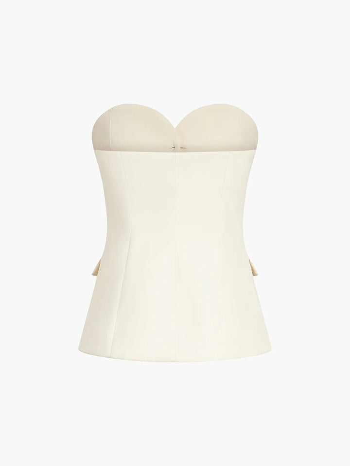 Stylish two-piece women's set: a classy strapless top paired with fashionable wide leg pants. Modern formal wear.