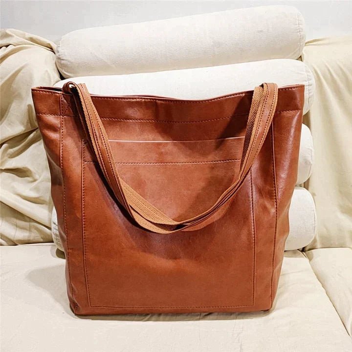 Luxury genuine leather women's tote bag. Spacious design, perfect as a stylish shoulder bag for work or daily errands.