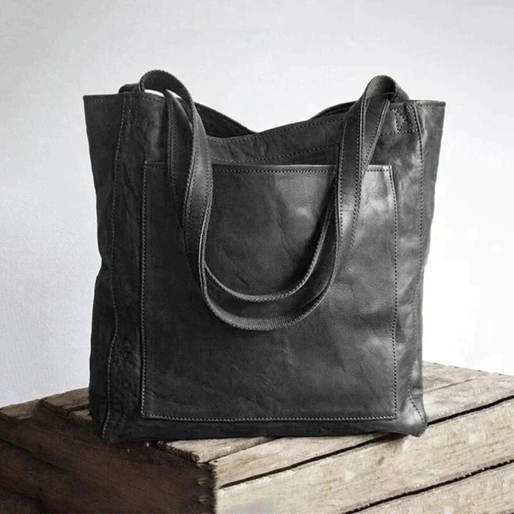 Spacious genuine leather women's tote bag. Versatile shoulder bag, perfect for carrying essentials daily or for work.