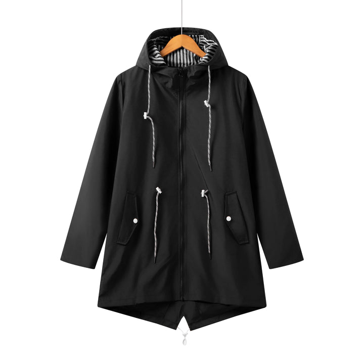 Lightweight women's waterproof trench coat with hood, perfect rain jacket for active outdoor lifestyle.