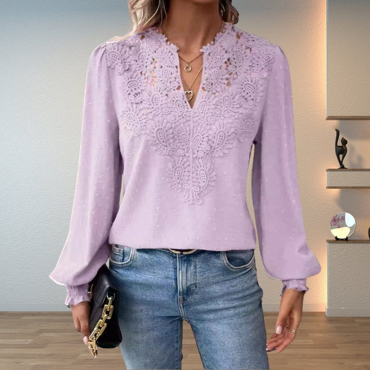 Sophisticated women's elegant lace-bodice long-sleeve V-neck blouse. Perfect for a dressy, fashionable look.