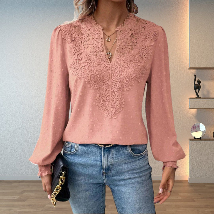Women's elegant long-sleeve blouse with lace bodice, V-neckline & smocked cuffs. A versatile fashion top.