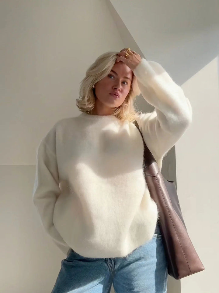 Versatile women's knit sweater, elegant & cozy, great for fall, winter, or casual wear.