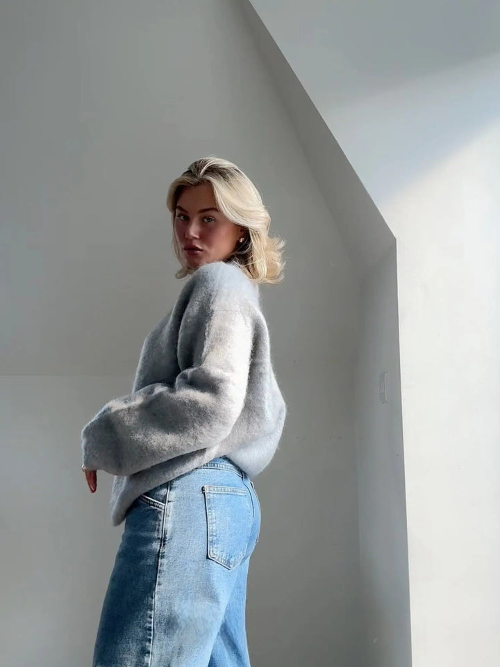 Elegant women's cozy knit sweater, long sleeve, perfect for stylish fall and winter looks.