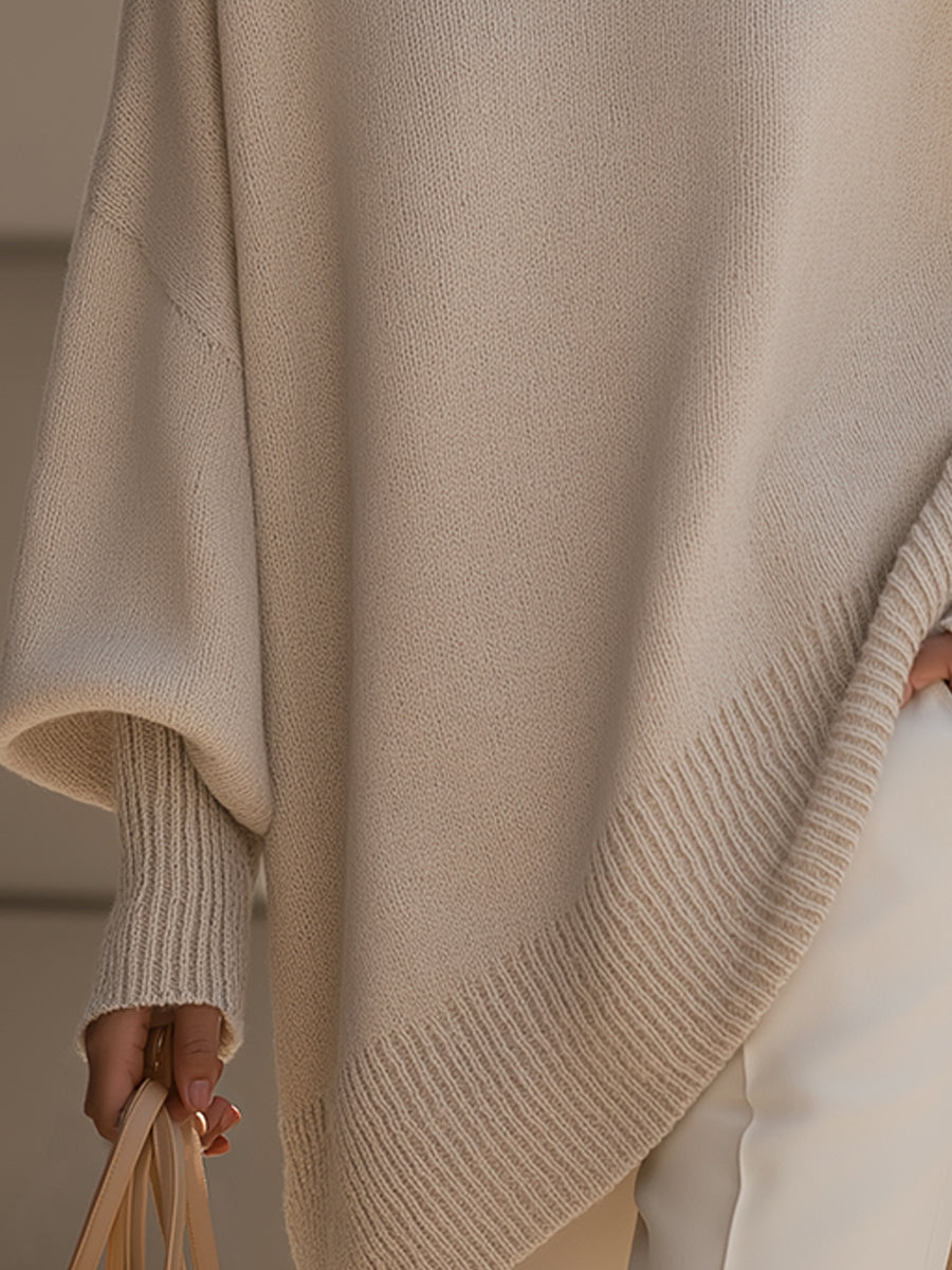 Chic oversized knit sweater for women, ideal for winter fashion and sophisticated comfort.