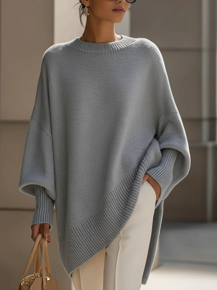 Elegant fall apparel: women's comfortable oversized knit sweater, a must-have for chic style.