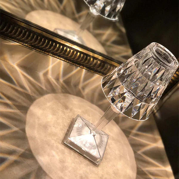 Touch dimming crystal lamp, rechargeable, provides radiant sparkling light for decor.
