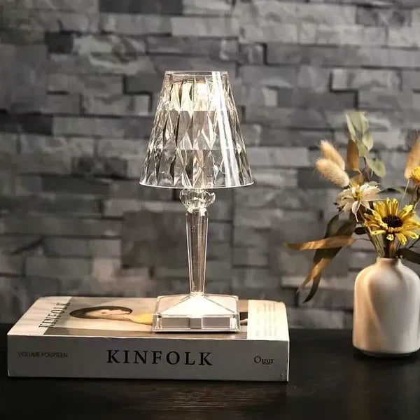 Dimmable sparkling crystal table lamp, rechargeable LED, enhances any modern home space.