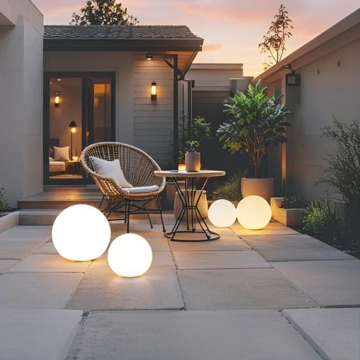 16-color RGB spherical garden light, weatherproof LED, remote control for versatile outdoor & indoor decor.