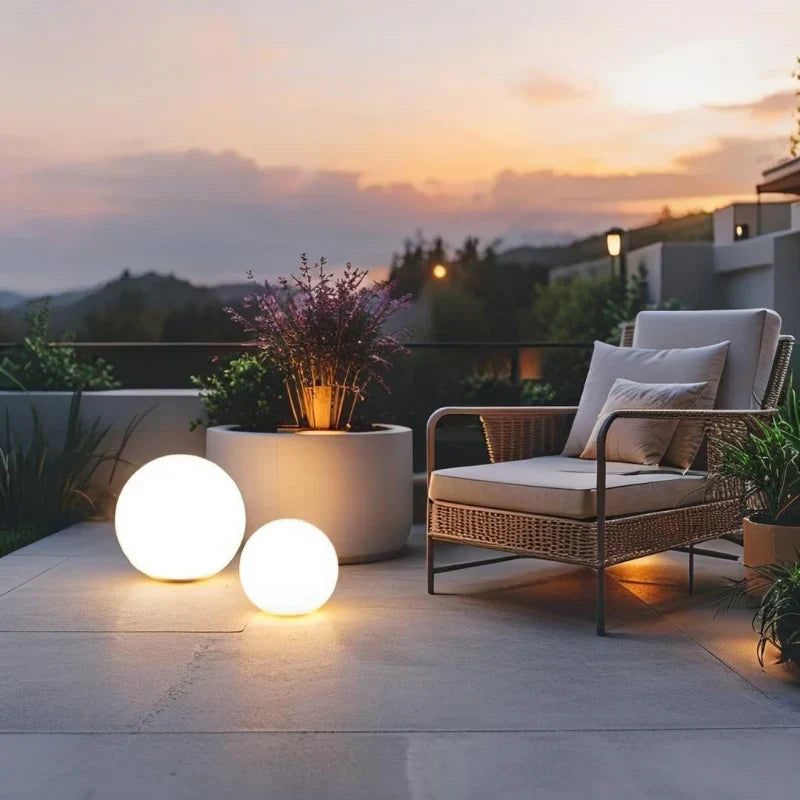 Weatherproof spherical LED light, 16-color RGB, remote, for garden & patio. Creates vibrant outdoor ambiance.