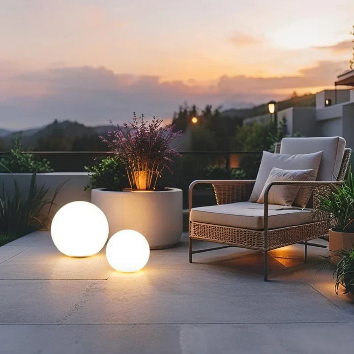 Weatherproof spherical LED light, 16-color RGB, remote, for garden & patio. Creates vibrant outdoor ambiance.