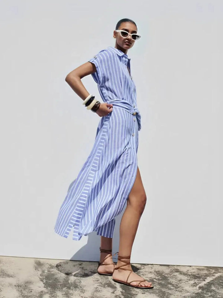Lightweight women's light blue striped maxi dress, button-down front, with a chic belt for a relaxed fit.