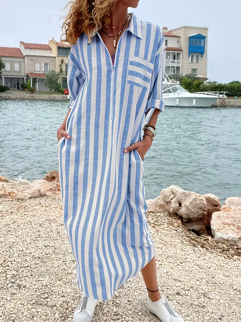 Flowy striped maxi shirt dress for women with full button-down front, ideal as a casual or summer dress.