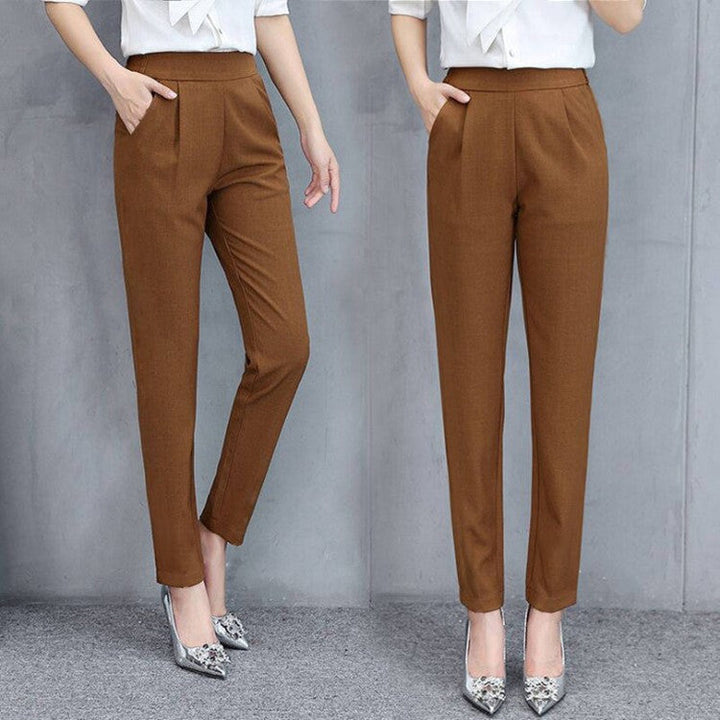 Comfortable women's relaxed fit trousers, ideal for everyday wear. Stylish and versatile fashion bottoms.