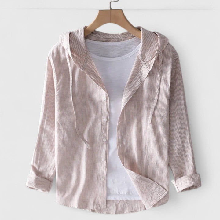 Soft women's hooded long-sleeve blouse, a comfortable top for relaxed everyday fashion.