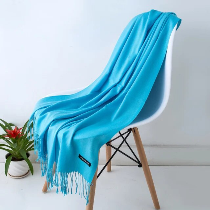 Luxurious Black cashmere blend scarf for women. Soft, elegant, and cozy winter fashion.