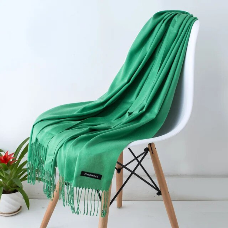 Luxurious Emerald Green cashmere blend scarf for women. Soft, elegant, and cozy winter fashion.