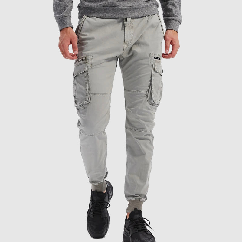 Khaki men's relaxed fit cargo jogger pants featuring multiple functional pockets, great for casual streetwear style.