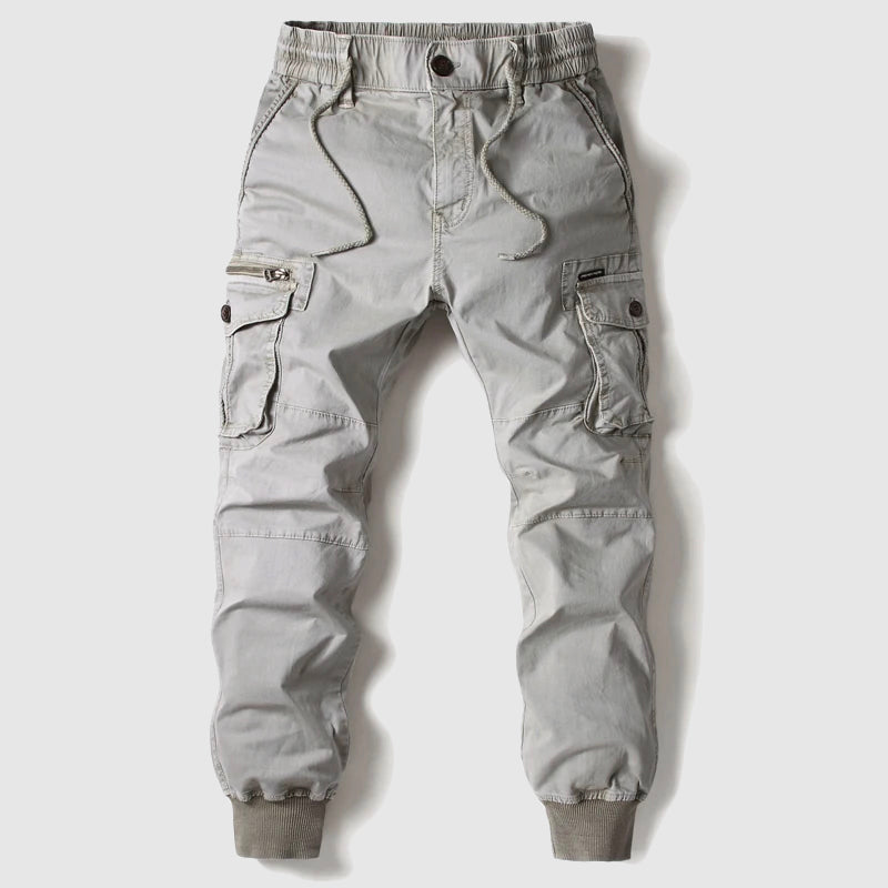 Green men's relaxed fit cargo joggers with elastic waist and side pockets, a comfortable choice for casual fashion.