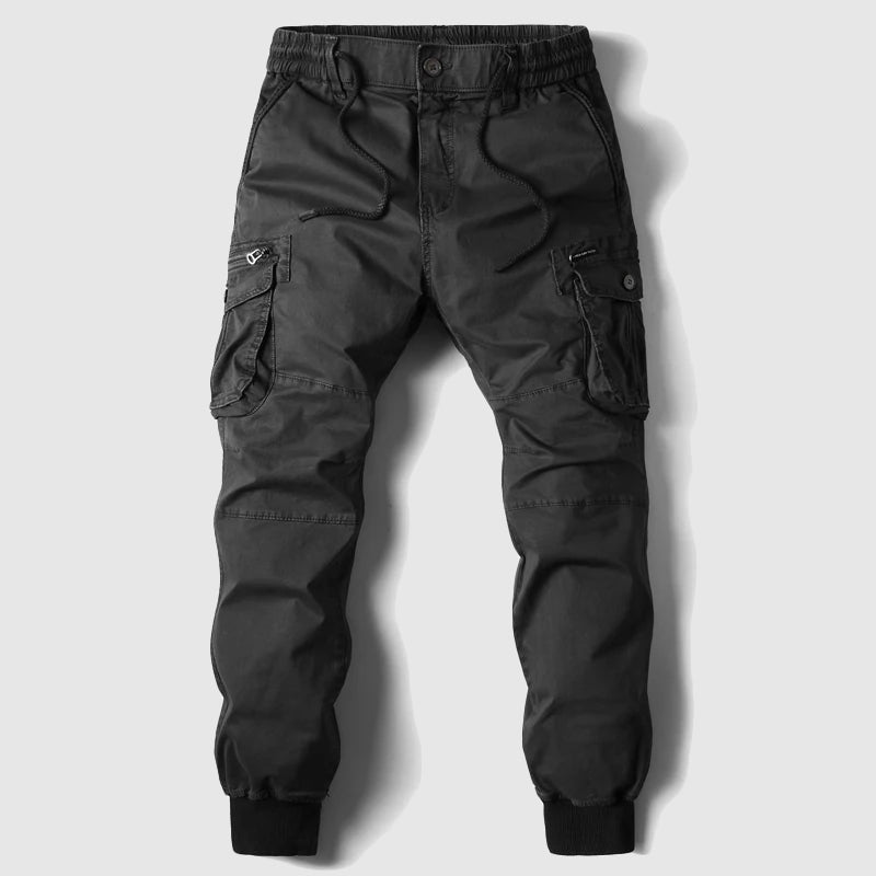 Black men's relaxed fit cargo jogger pants with functional utility pockets, a versatile option for comfortable streetwear.
