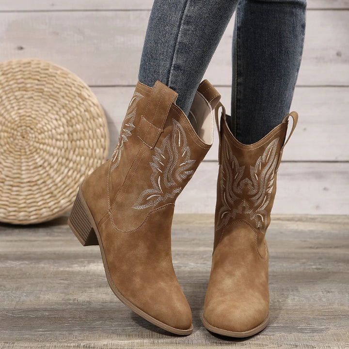 Classic women's western ankle boots with beautiful embroidery, supportive block heel, and comfortable pointed toe design.