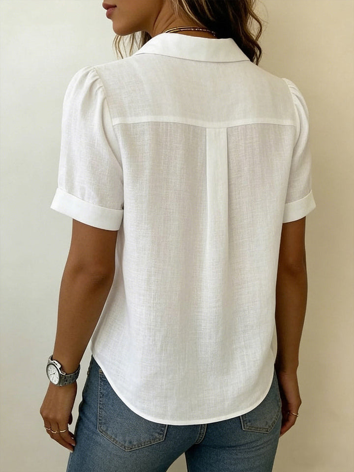 Stylish men's textured short sleeve button-up shirt, ideal for a modern casual look or elevated summer outfit.