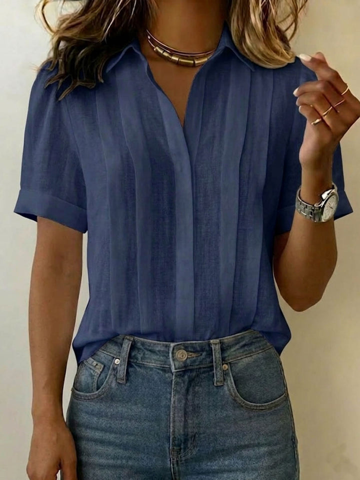 Sophisticated men's textured short sleeve shirt, a comfortable and stylish button-up for modern summer fashion.