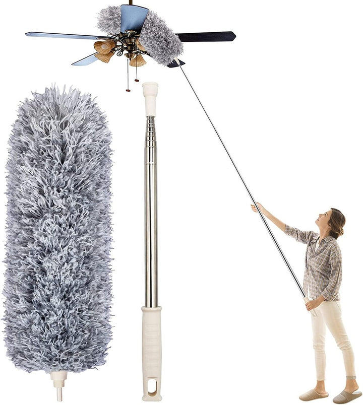 Telescopic microfiber dust mop extended to reach a high ceiling, cleaning cobwebs and dust easily.