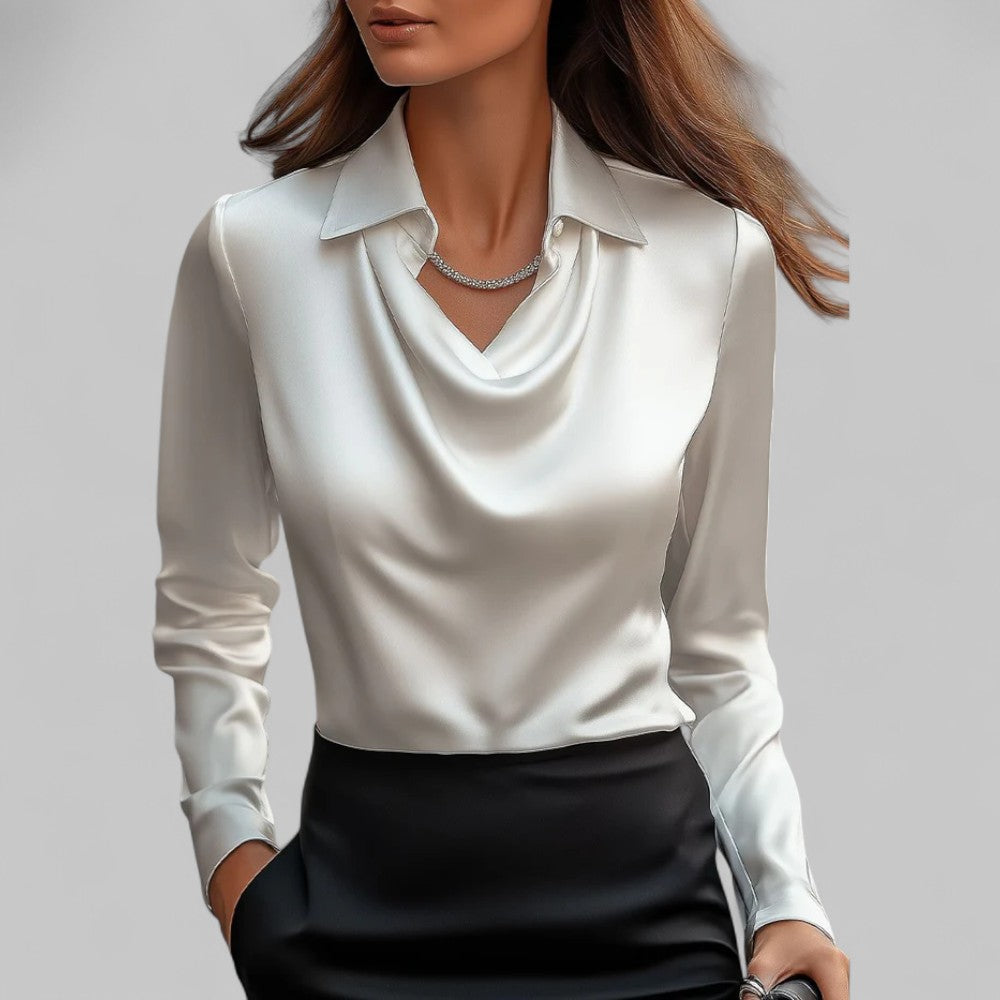Elegant women's blouse with draped cowl neck, long sleeves, perfect for office or evening wear.