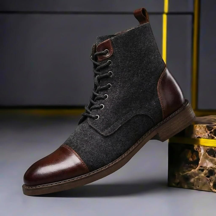 Durable men's insulated winter ankle boots with traction sole for superior grip in cold, snowy conditions.