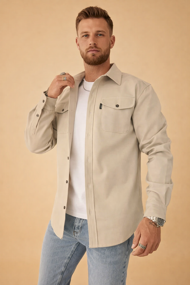 Button-up collared long-sleeve polo for men. Ideal for a sophisticated, modern casual fashion statement.