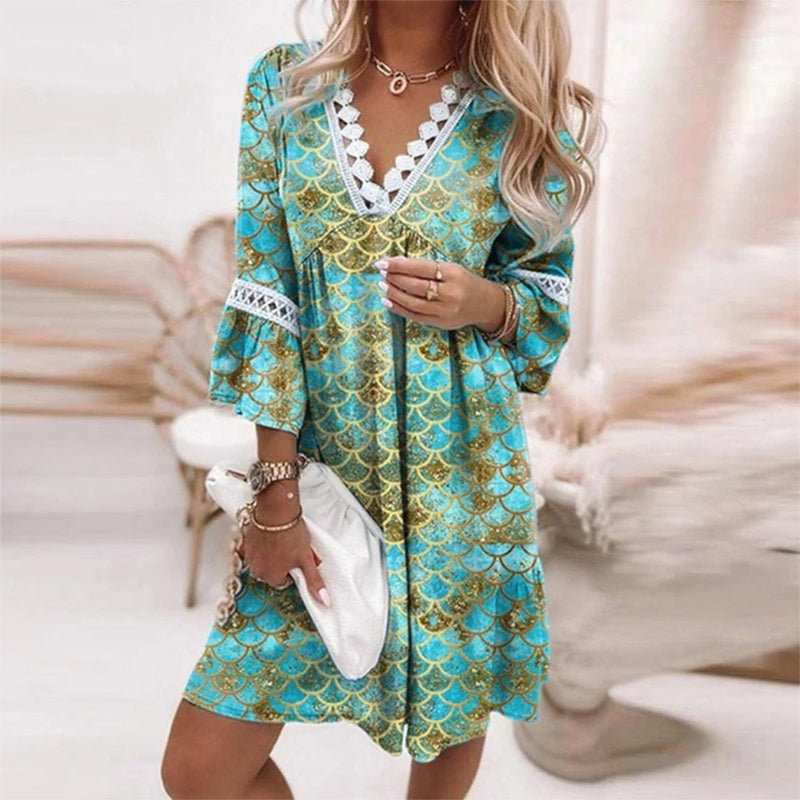 Relaxed fit women's short bohemian printed dress, ideal for comfortable day wear or summer outings.