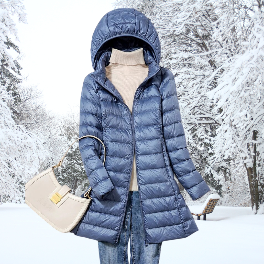 Insulated women's puffer jacket for ultimate winter warmth. Ultralight design for everyday cold weather comfort.
