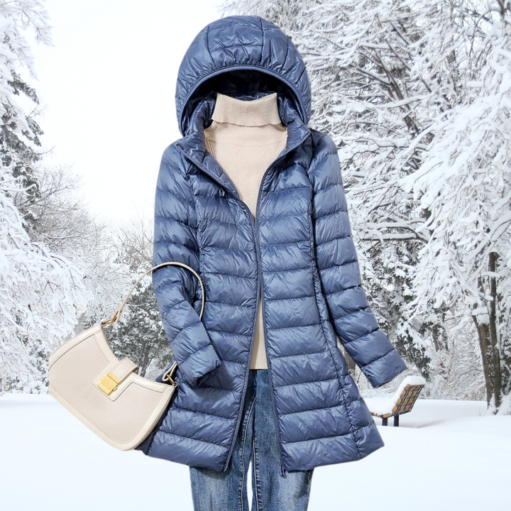 Insulated women's puffer jacket for ultimate winter warmth. Ultralight design for everyday cold weather comfort.