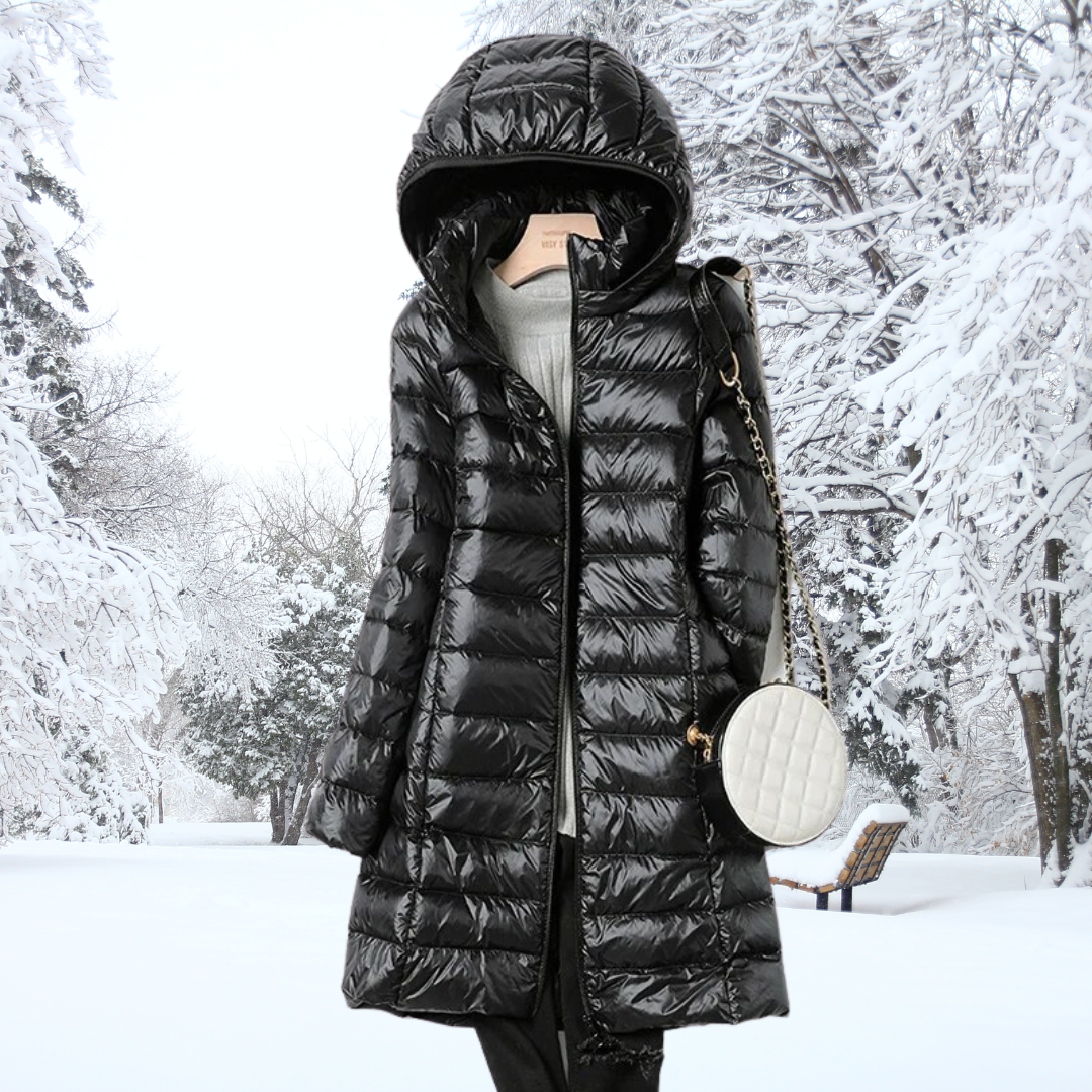 Quilted ultralight women's puffer jacket. Warm, insulated winter coat with a removable hood for versatile style.