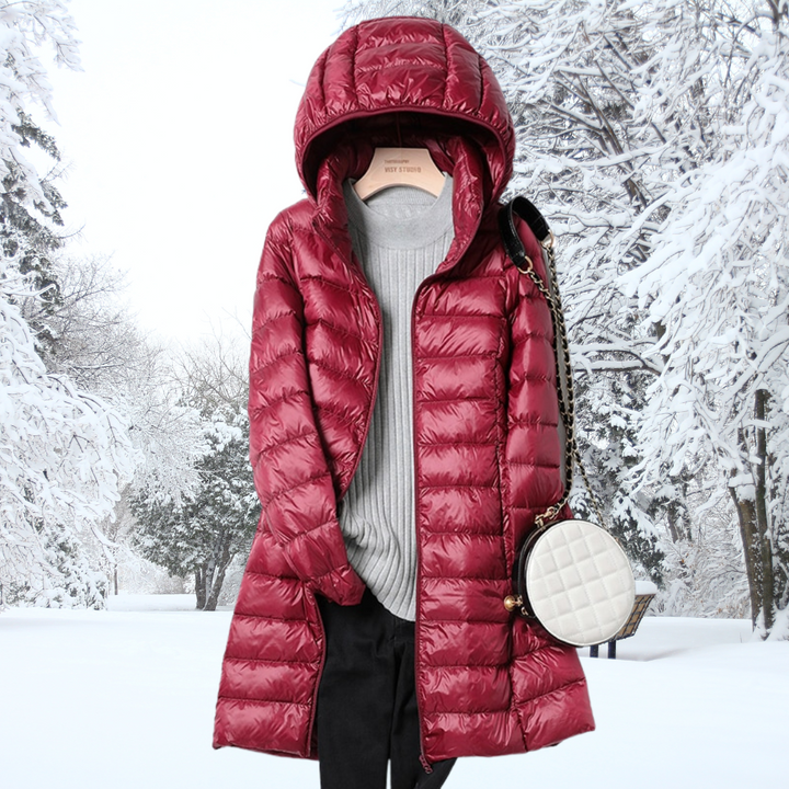 Women's stylish ultralight puffer jacket. Insulated winter coat with removable hood for everyday cold weather wear.