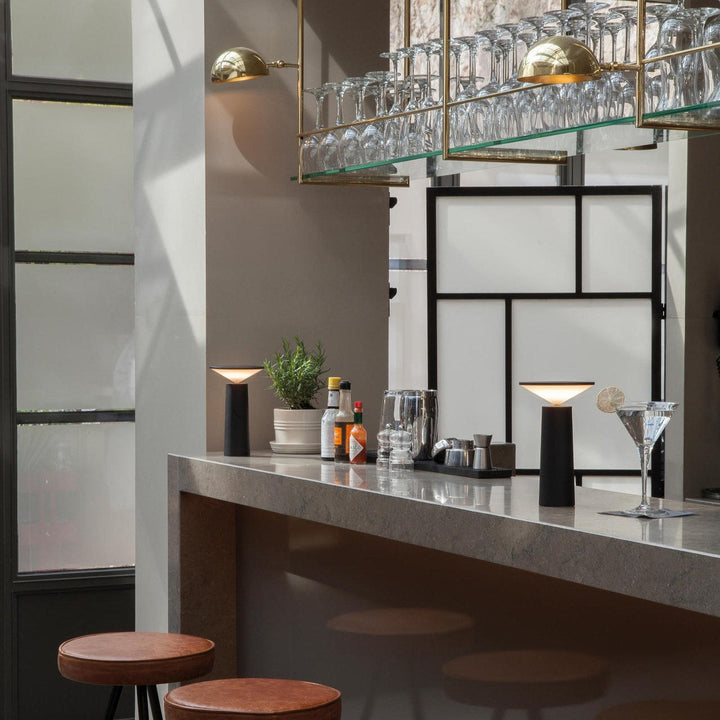 Modern dimmable LED lamp with flexible arm, ideal for reading or ambient light.