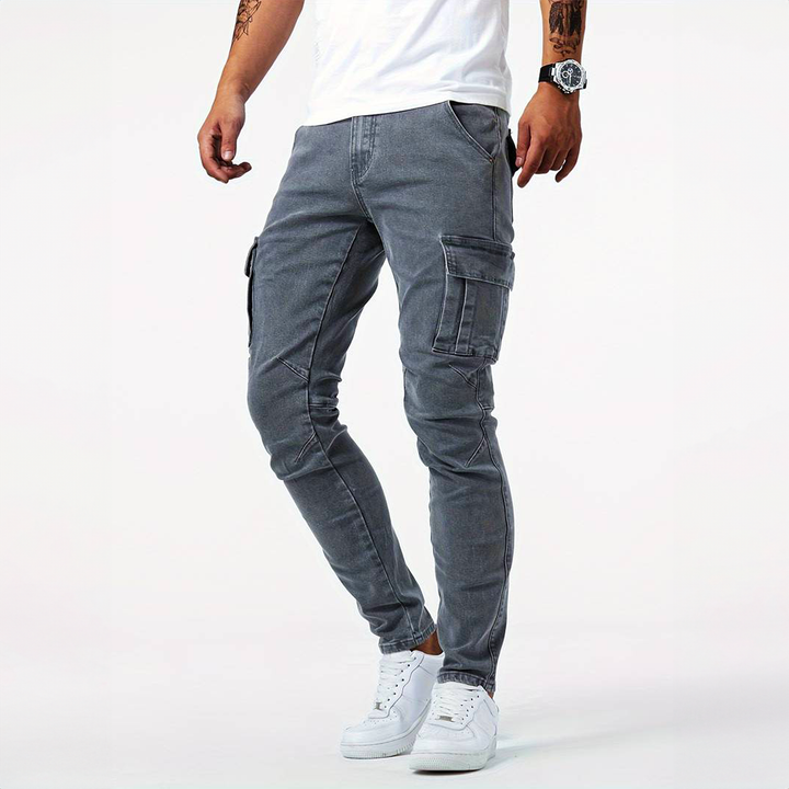 Men's stretch denim cargo pants in urban style, offering comfort & utility for everyday wear.