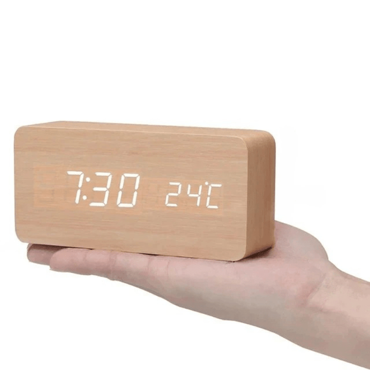 Sleek LED digital clock, voice control, adds modern touch to any room.