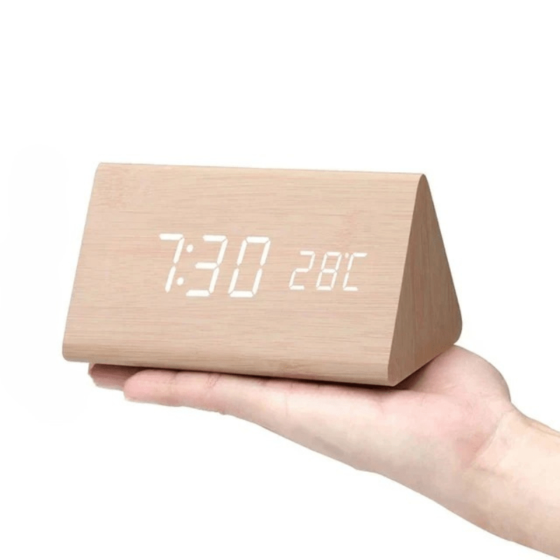 Contemporary LED desk clock with voice command and alarm functions.