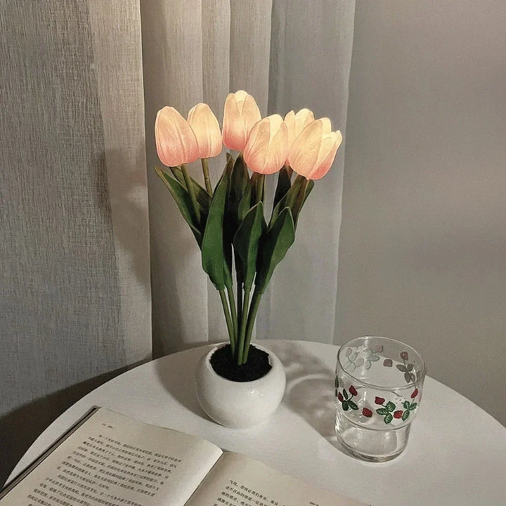 Soft glowing tulip night light, an elegant LED decorative lamp for a bedroom.