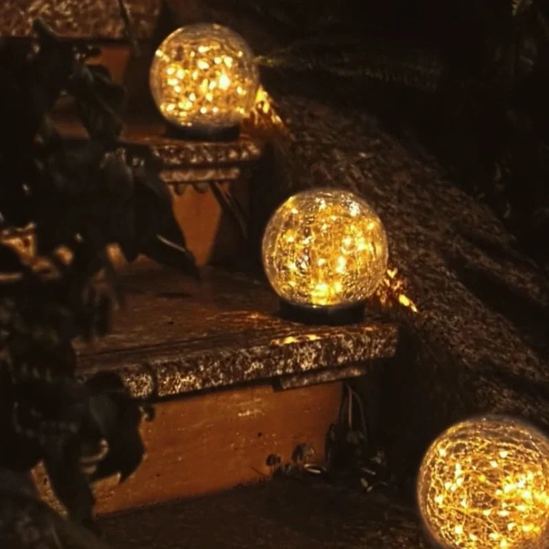 Decorative solar garden light, crackled glass orb for patio & landscape.