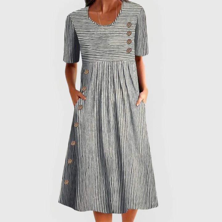 Versatile women's gray striped midi dress, ideal for everyday wear. Effortless fashion & comfortable style.