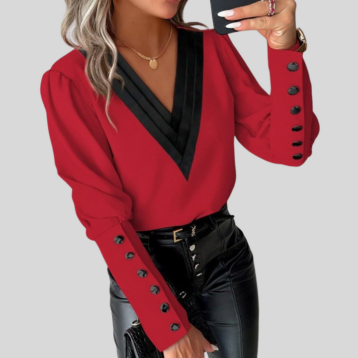 Elegant women's button-front blouse with dramatic gigot sleeves, perfect for chic casual or dressy occasions.